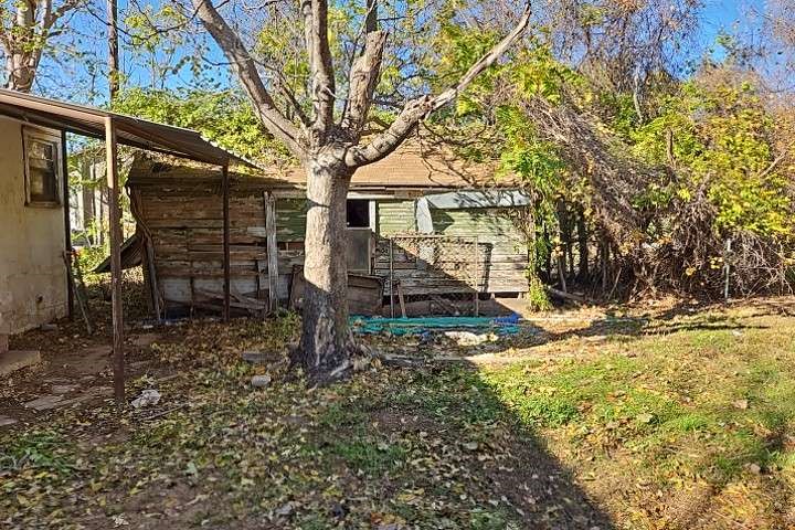 644 16th Street Colorado City, TX 79512 - Photo 10 of 12 a view of a house with a yard