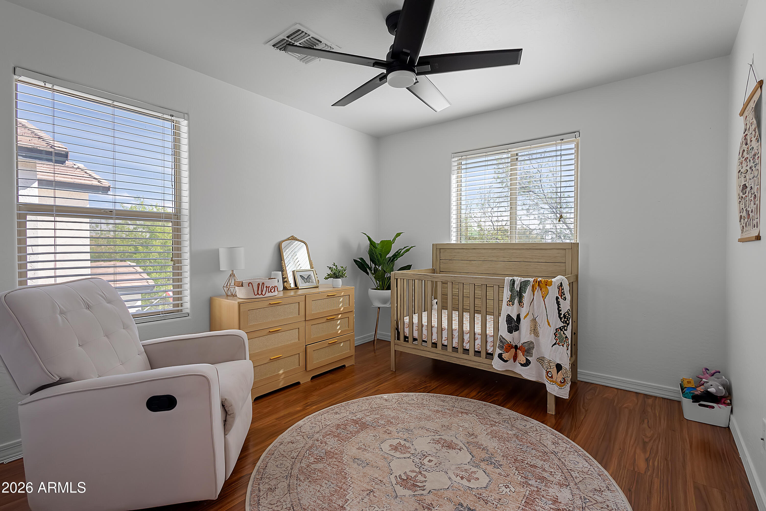 4120 South Butte Lane Gilbert, AZ 85297 - Photo 24 of 29 a bedroom with furniture and a window