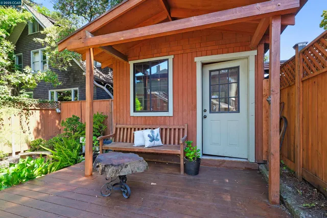 a view of a patio with a table and chairs in patio