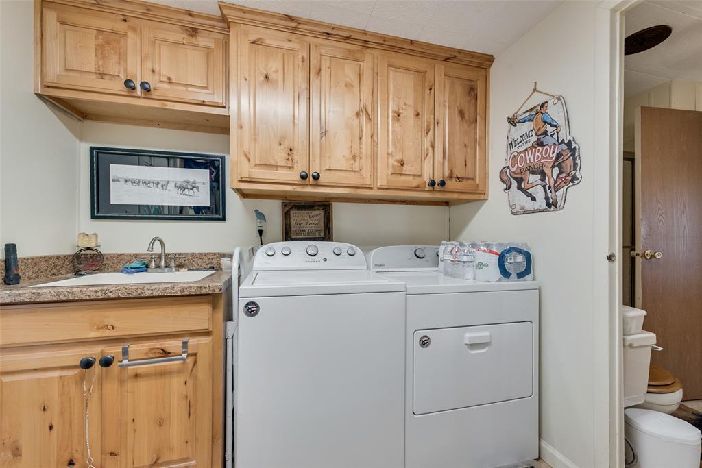 510 North D Ranch Road Waxahachie, TX 75167 - Photo 17 of 38 a utility room with dryer and washer