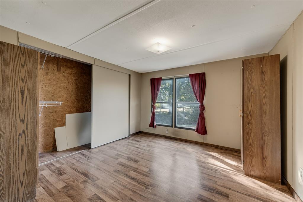 510 North D Ranch Road Waxahachie, TX 75167 - Photo 31 of 38 a view of an empty room with a window