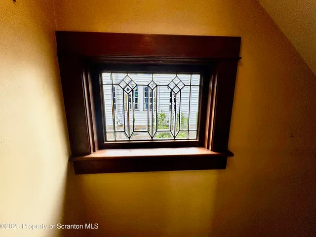 a view of a living room and bathroom