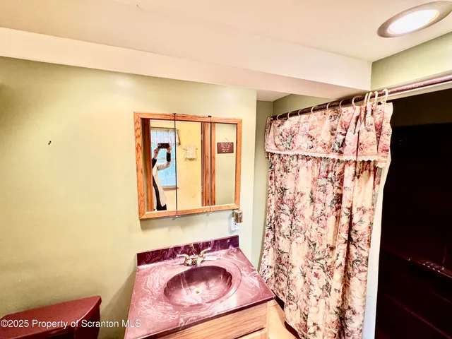 a view of a wooden door and an outdoor space