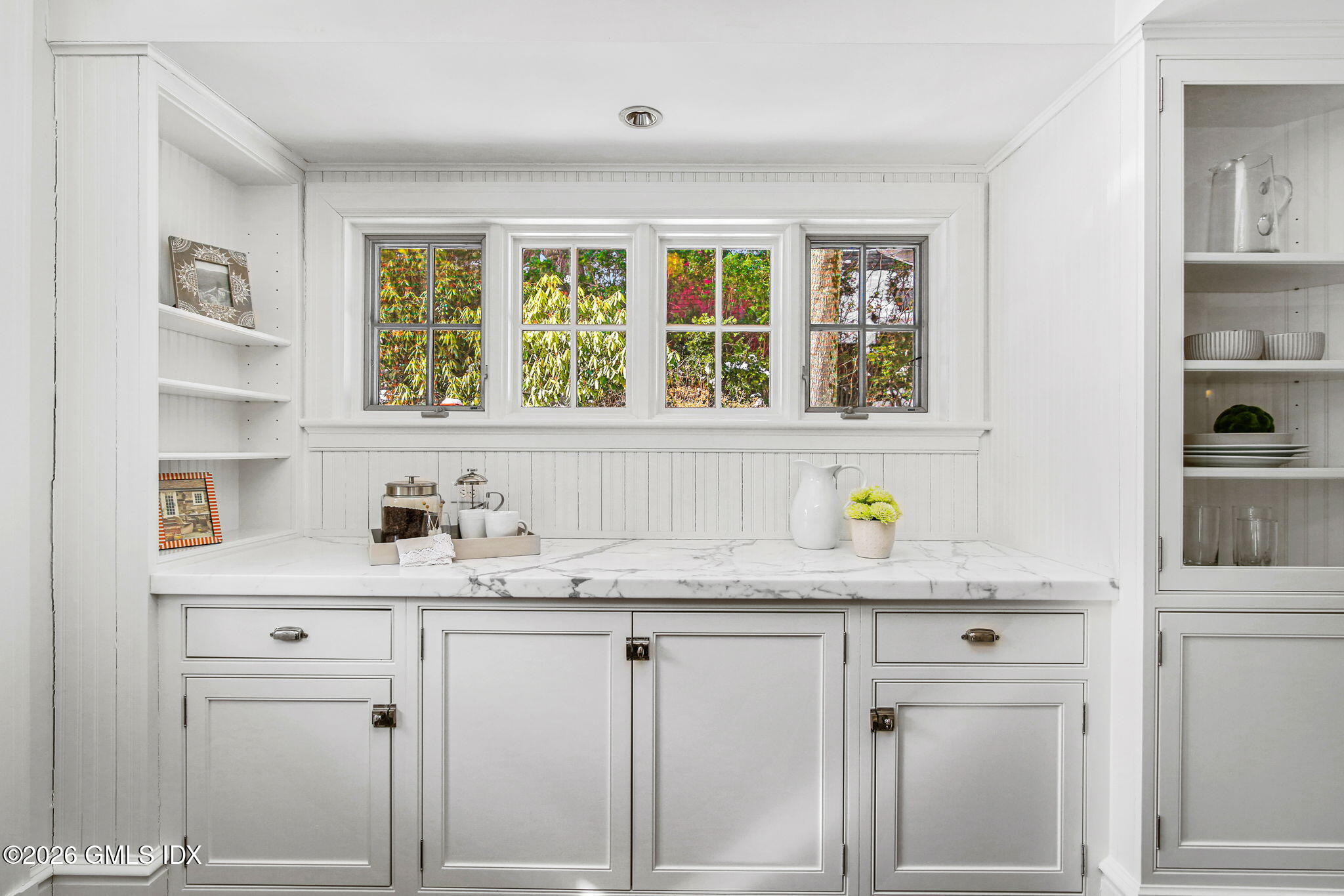 164 Round Hill Road Greenwich, CT 06831 - Photo 17 of 67 a kitchen with stainless steel appliances granite countertop a sink window and cabinets