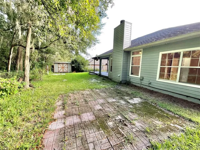 a house with garden in front of it