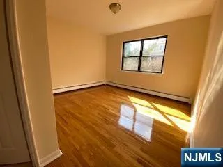 a view of empty room with windows