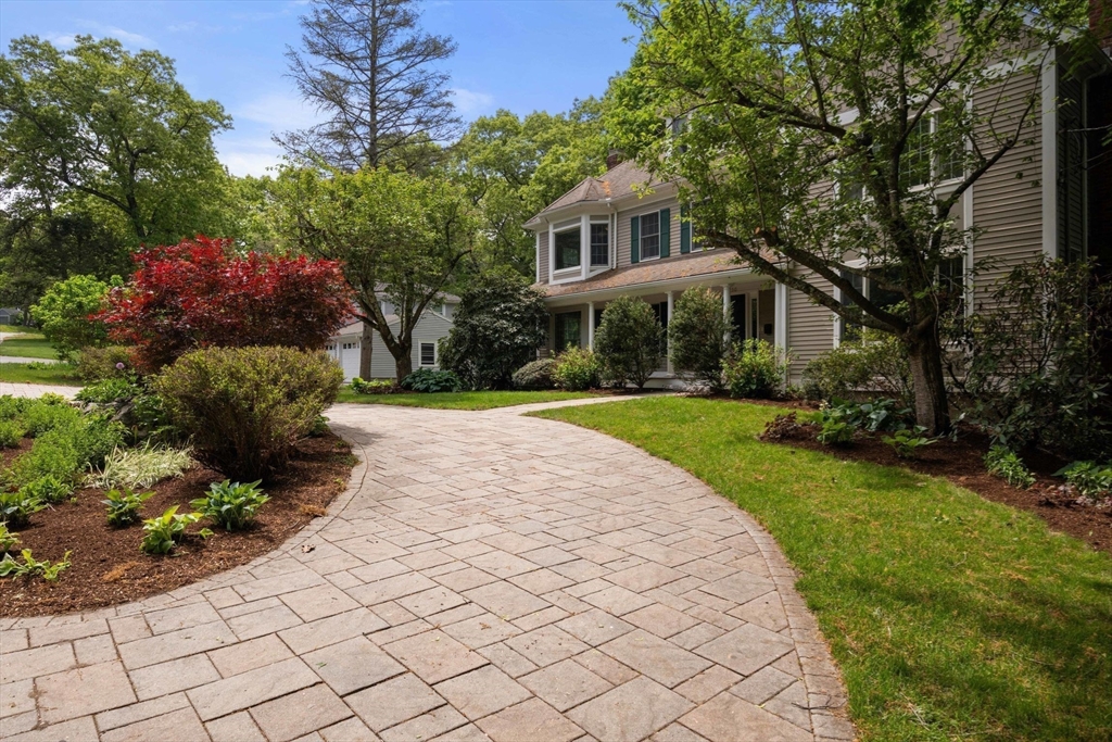 230 Follen Road Lexington, MA 02421 - Photo 2 of 21 a front view of a house with a yard and potted plants