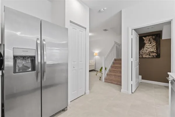 a kitchen with a stove and a microwave