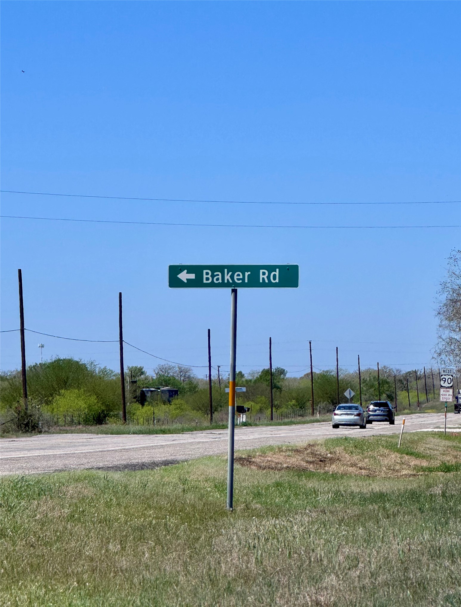 3775 Baker Road Kingsbury, TX 78638 - Photo 3 of 14 Road sign indicating "Baker Rd" with an arrow
