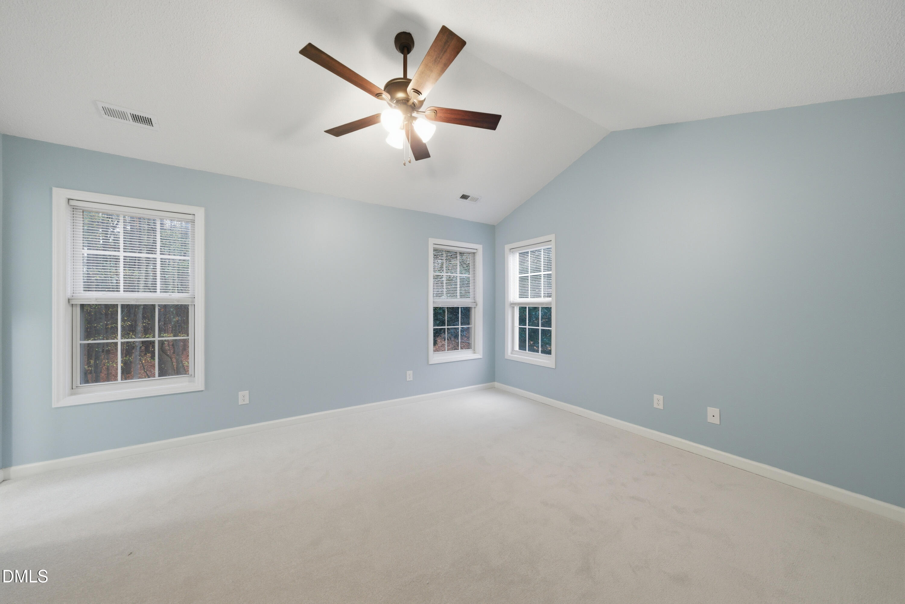 3100 Countryman Court Wake Forest, NC 27587 - Photo 25 of 42 an empty room with window and ceiling fan