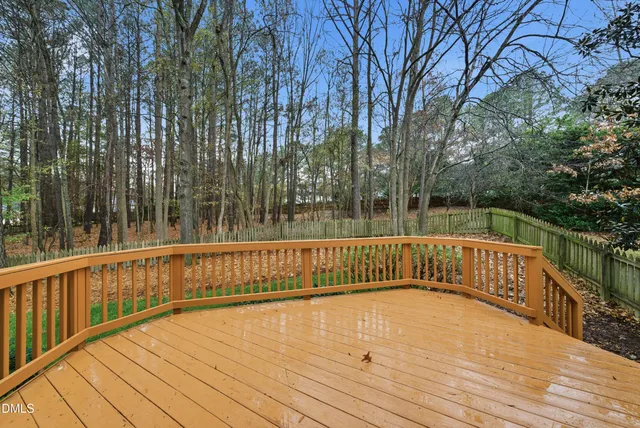 a view of balcony with wooden floor