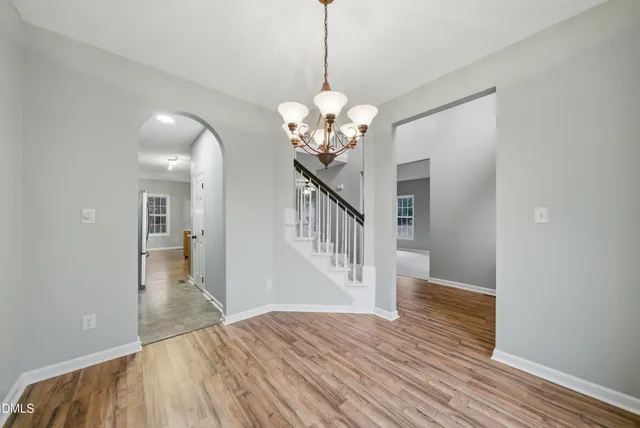 a view of entryway with wooden floor