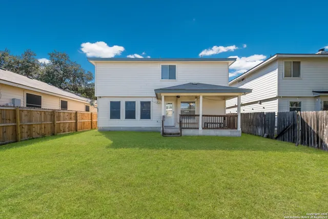 a picture of a bathroom with a shower