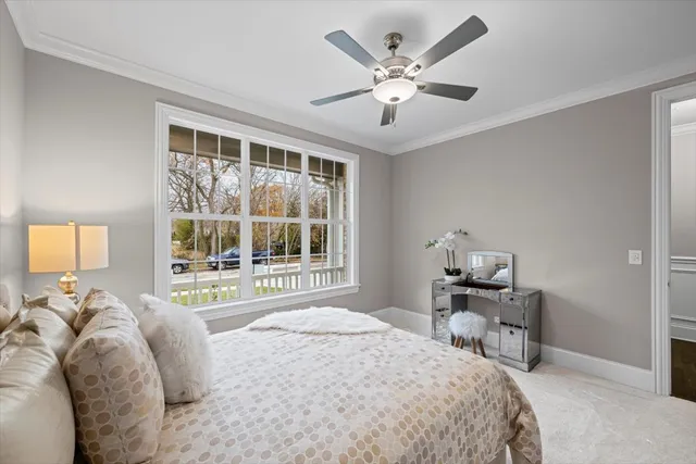 a bathroom with a double vanity sink toilet mirror and bathtub