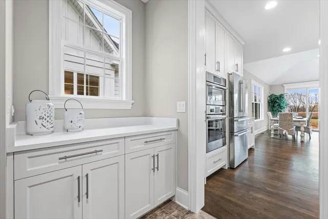 a view of entryway with wooden floor