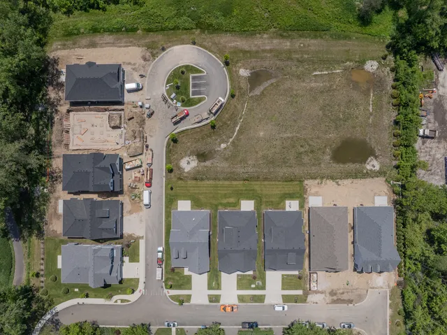 an aerial view of a house with a garden