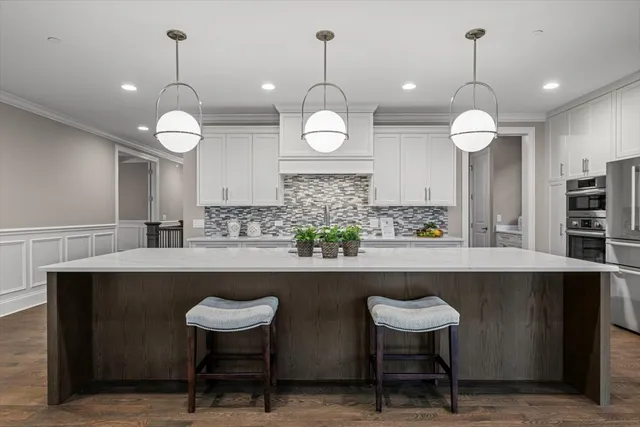 a view of a dining room and chairs in a room