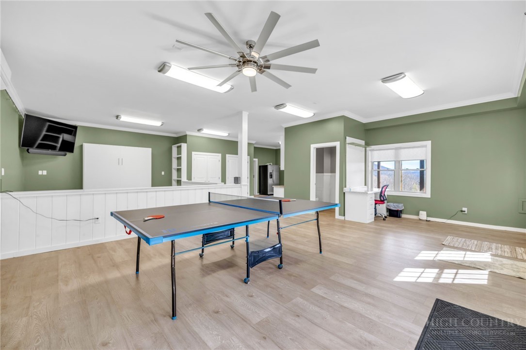 7994 3 Top Road Todd, NC 28684 - Photo 35 of 50 a room with furniture and wooden floor