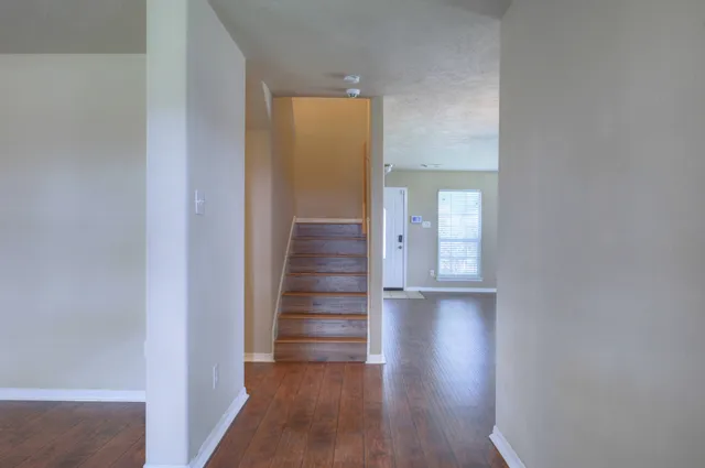 a view of entryway with wooden floor