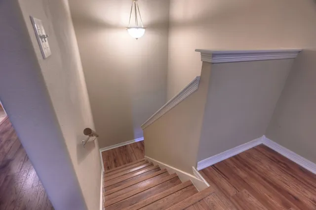 a view of entryway with wooden floor