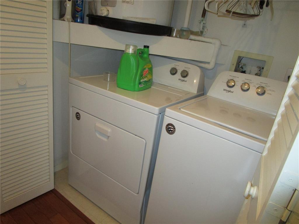 3968 Sailmaker Lane, Unit 3968 Holiday, FL 34691 - Photo 54 of 70 a utility room with dryer and washer