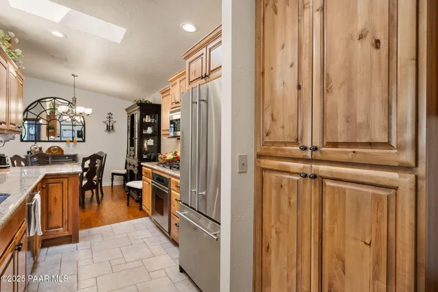 a view of a hallway with a furniture