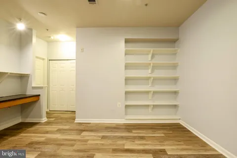 a view of a room with storage and utility room
