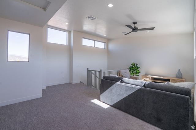 2972 West 570 North Hurricane, UT 84737 - Photo 67 of 104 Carpeted living area featuring recessed lighting and ceiling fan