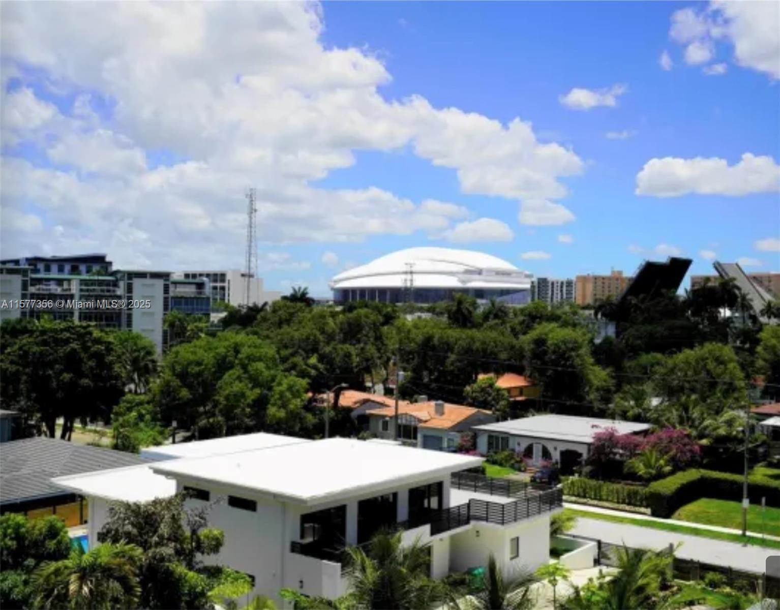 1010 Northwest 11th Street, Unit 601 Miami, FL 33136 - Photo 17 of 35 a view of city from balcony with seating space
