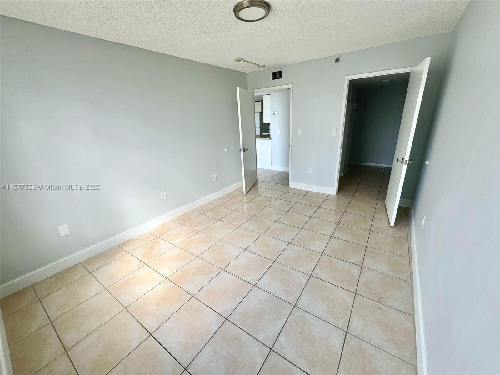 1010 Northwest 11th Street, Unit 601 Miami, FL 33136 - Photo 28 of 35 a view of an empty room and a window