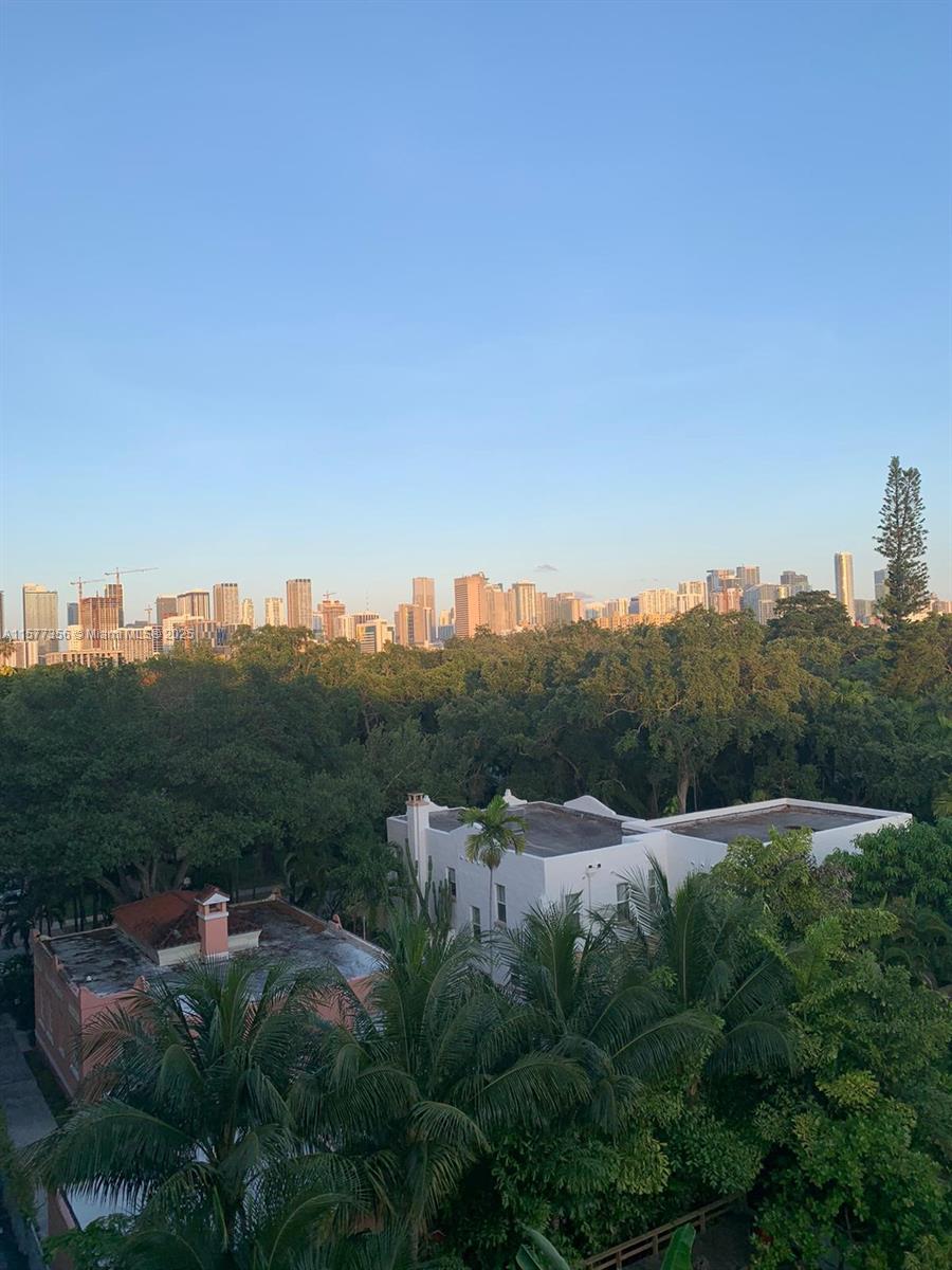 1010 Northwest 11th Street, Unit 601 Miami, FL 33136 - Photo 3 of 35 a view of a city with lush green forest