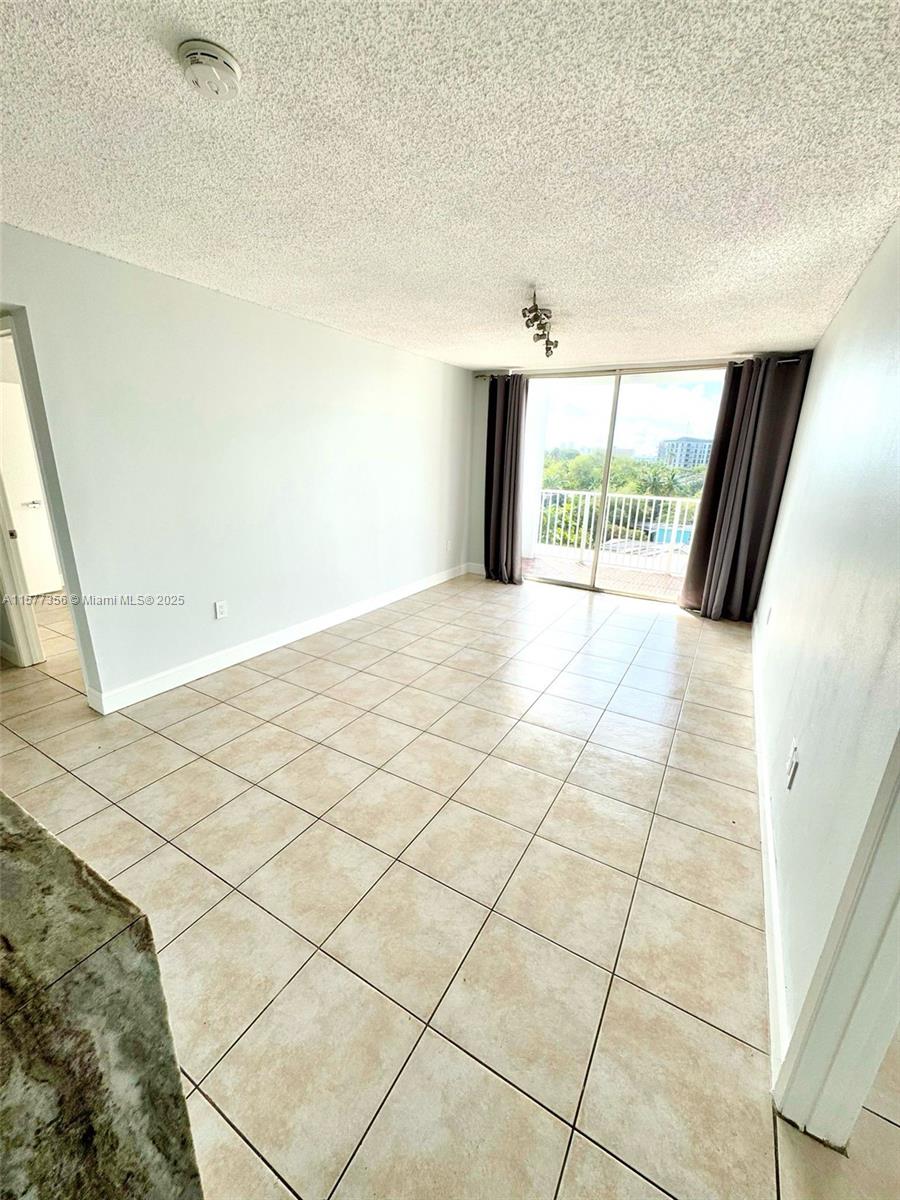 1010 Northwest 11th Street, Unit 601 Miami, FL 33136 - Photo 32 of 35 a view of an empty room with a window