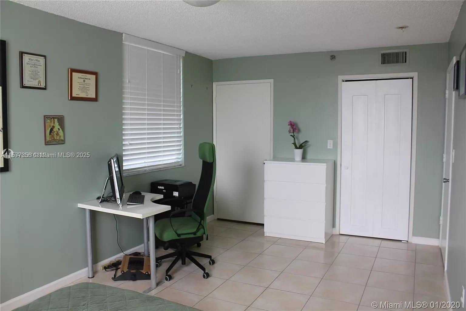 1010 Northwest 11th Street, Unit 601 Miami, FL 33136 - Photo 8 of 35 a view of a workspace with furniture