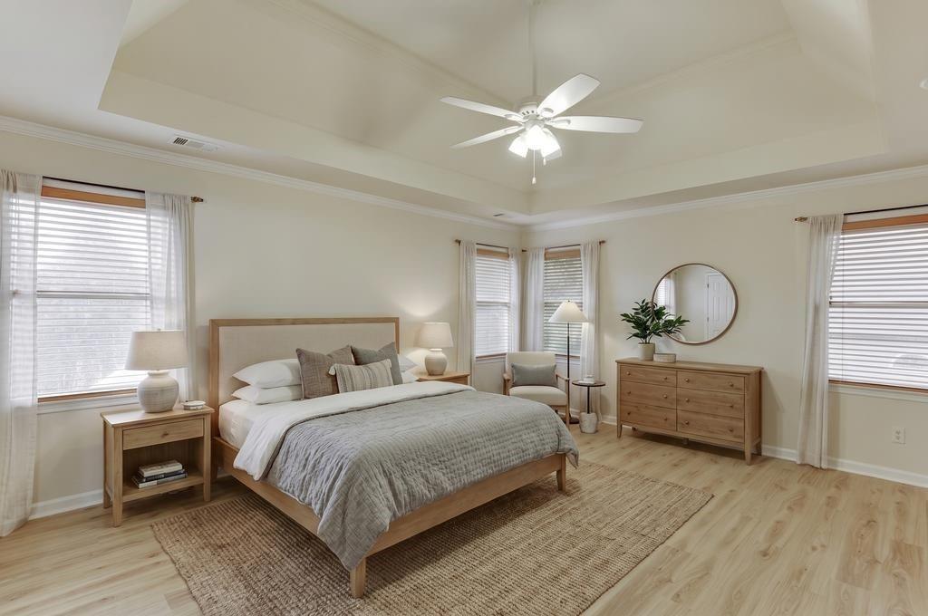 1830 Sanborne Way Dacula, GA 30019 - Photo 15 of 33 a bedroom with a bed mirror and window