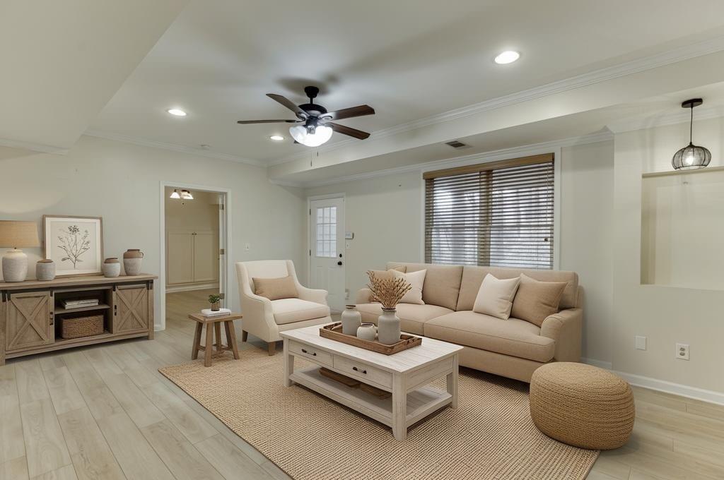 1830 Sanborne Way Dacula, GA 30019 - Photo 17 of 33 a living room with furniture ceiling fan and a wooden floor