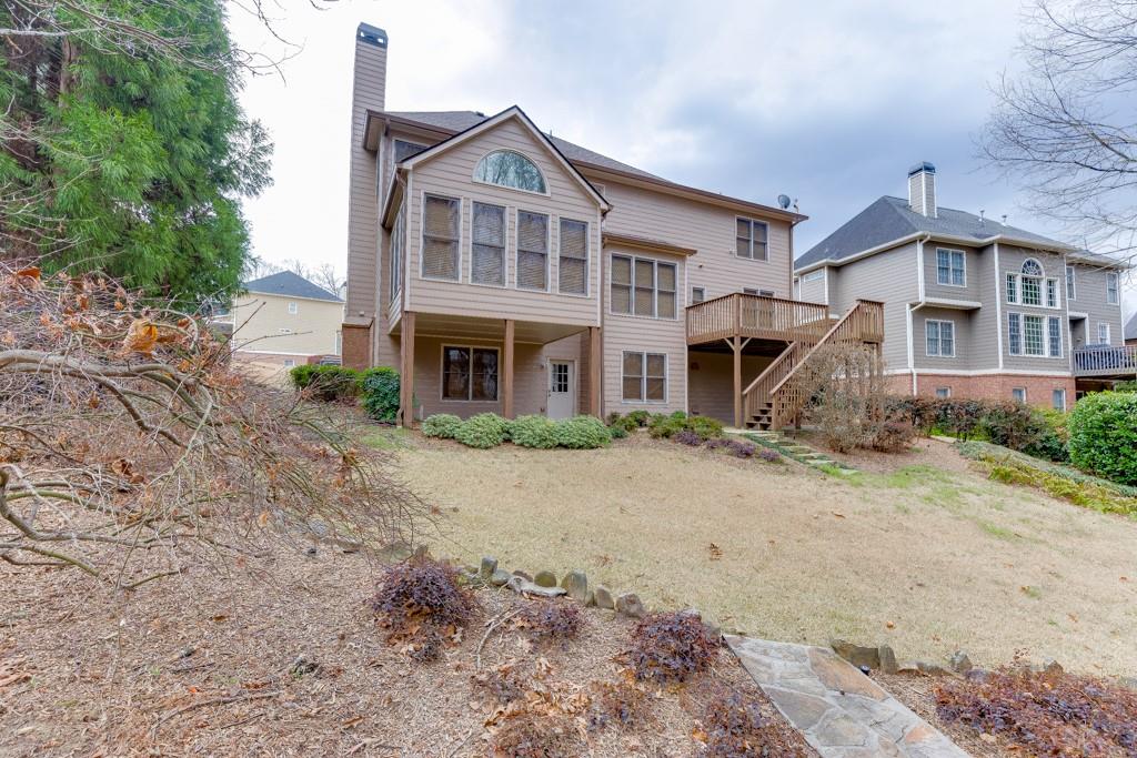 1830 Sanborne Way Dacula, GA 30019 - Photo 24 of 33 a front view of a house with a yard
