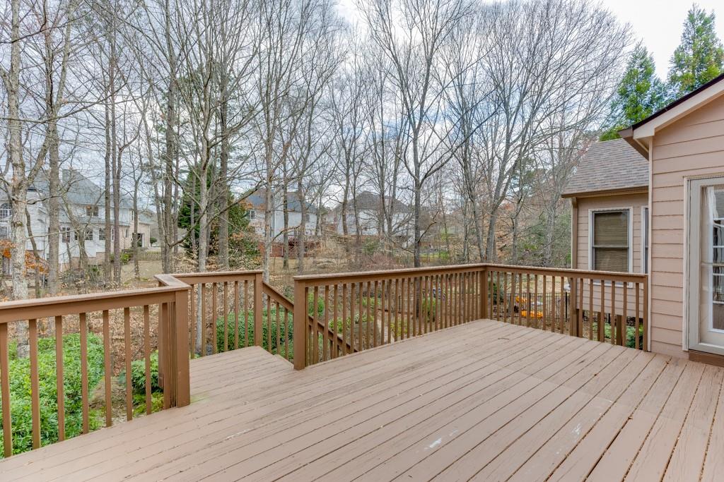 1830 Sanborne Way Dacula, GA 30019 - Photo 27 of 33 a view of balcony with wooden floor and fence