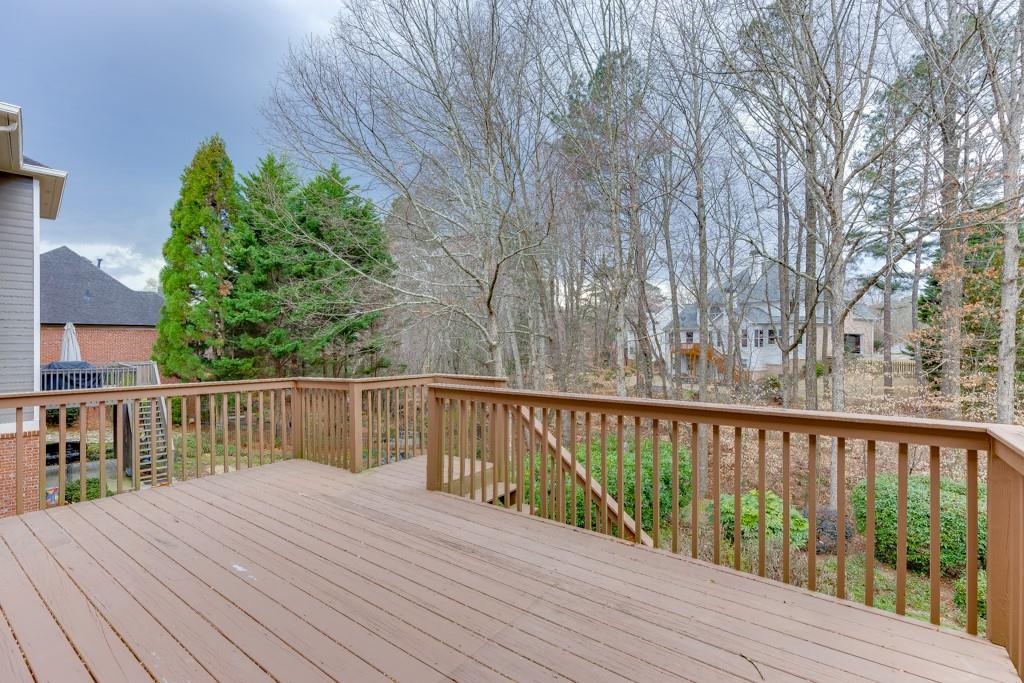 1830 Sanborne Way Dacula, GA 30019 - Photo 28 of 33 a view of balcony with wooden floor and fence