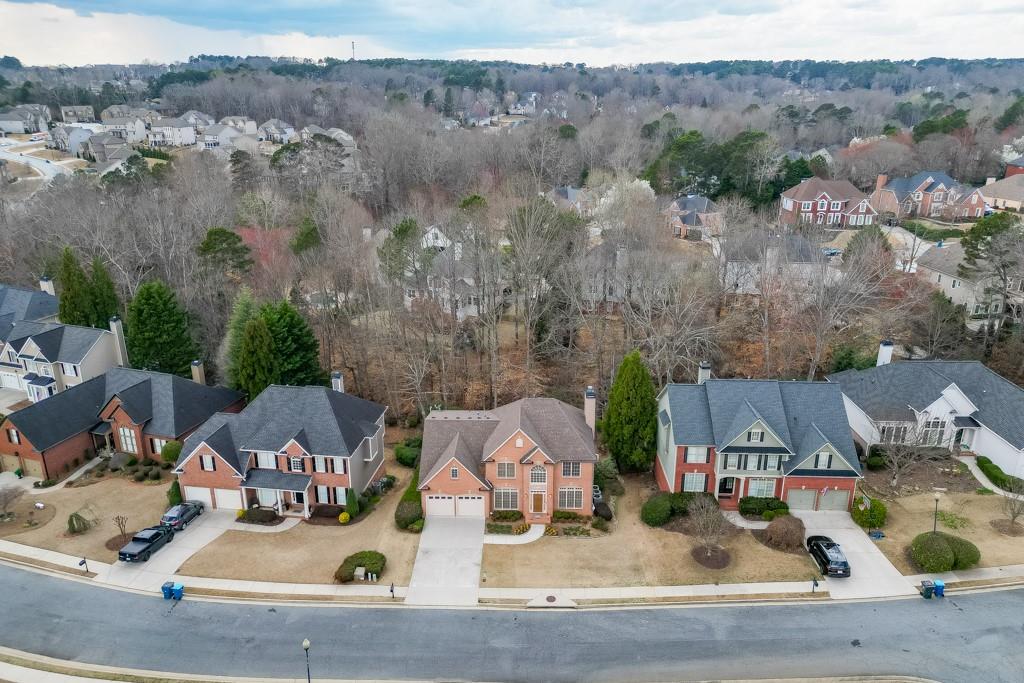 1830 Sanborne Way Dacula, GA 30019 - Photo 30 of 33 an aerial view of residential houses with outdoor space