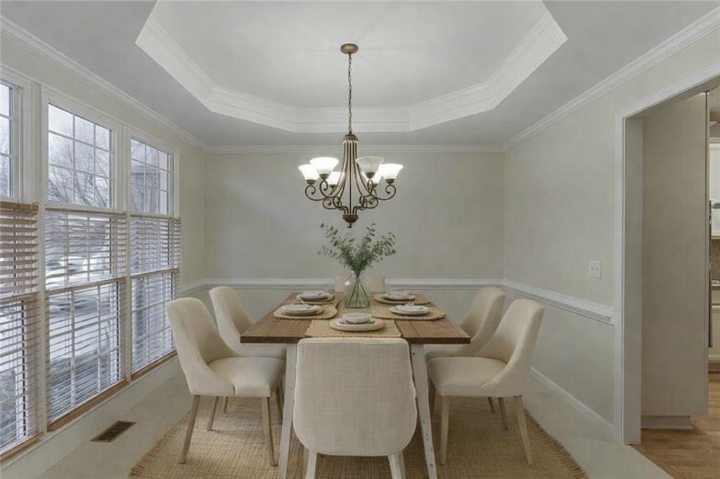 1830 Sanborne Way Dacula, GA 30019 - Photo 4 of 33 a view of a dining room with furniture window and outside view