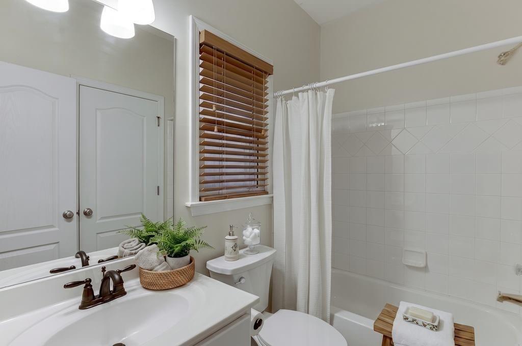 1830 Sanborne Way Dacula, GA 30019 - Photo 10 of 33 a view of a bathroom with a tub and shower