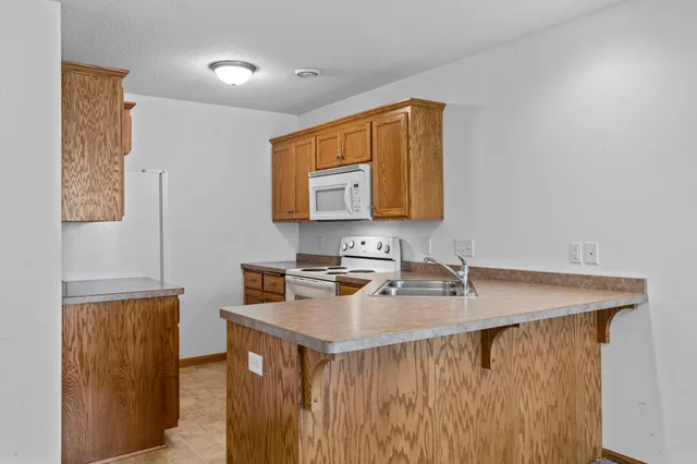 $215,000 | 301 Roosevelt Street South, Unit G, Cambridge, MN 55008