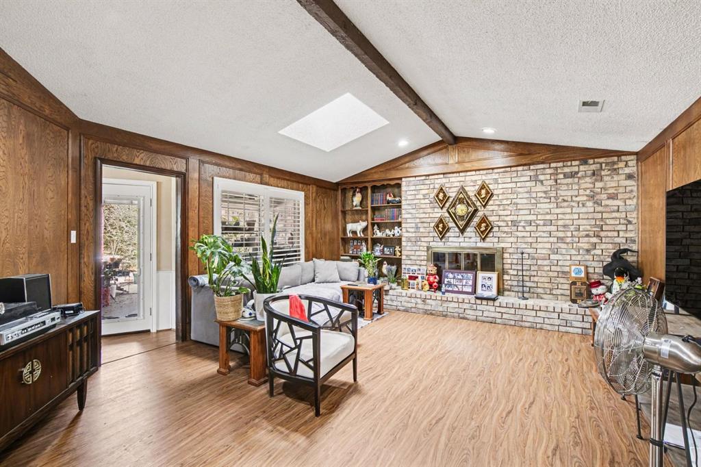 5009 River Ridge Road Arlington, TX 76017 - Photo 15 of 28 a living room with furniture and a large window