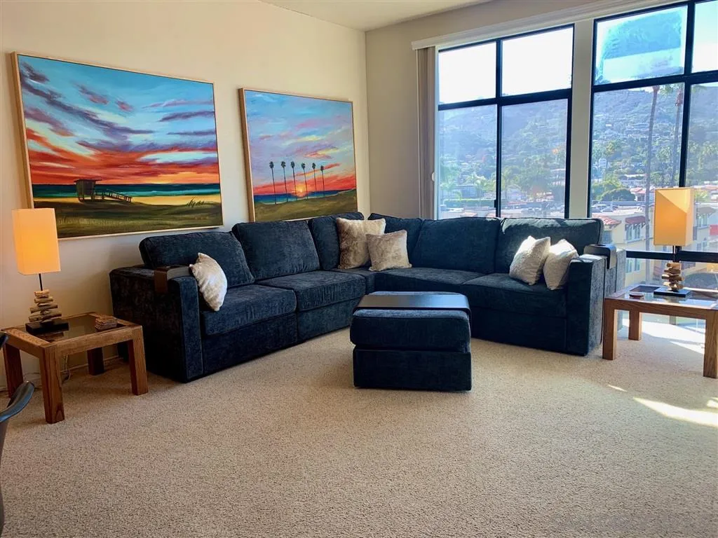 2130 Vallecitos, Unit 441 La Jolla, CA 92037 - Photo 11 of 25 a living room with furniture and a large window