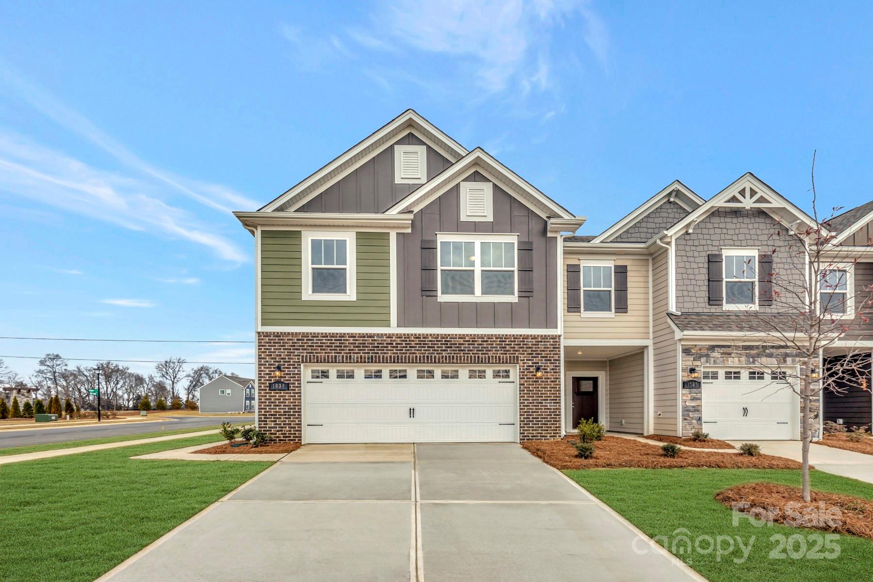 1030 Overbrook Place Wingate, NC 28174 - Photo 1 of 21 a front view of a house with a yard