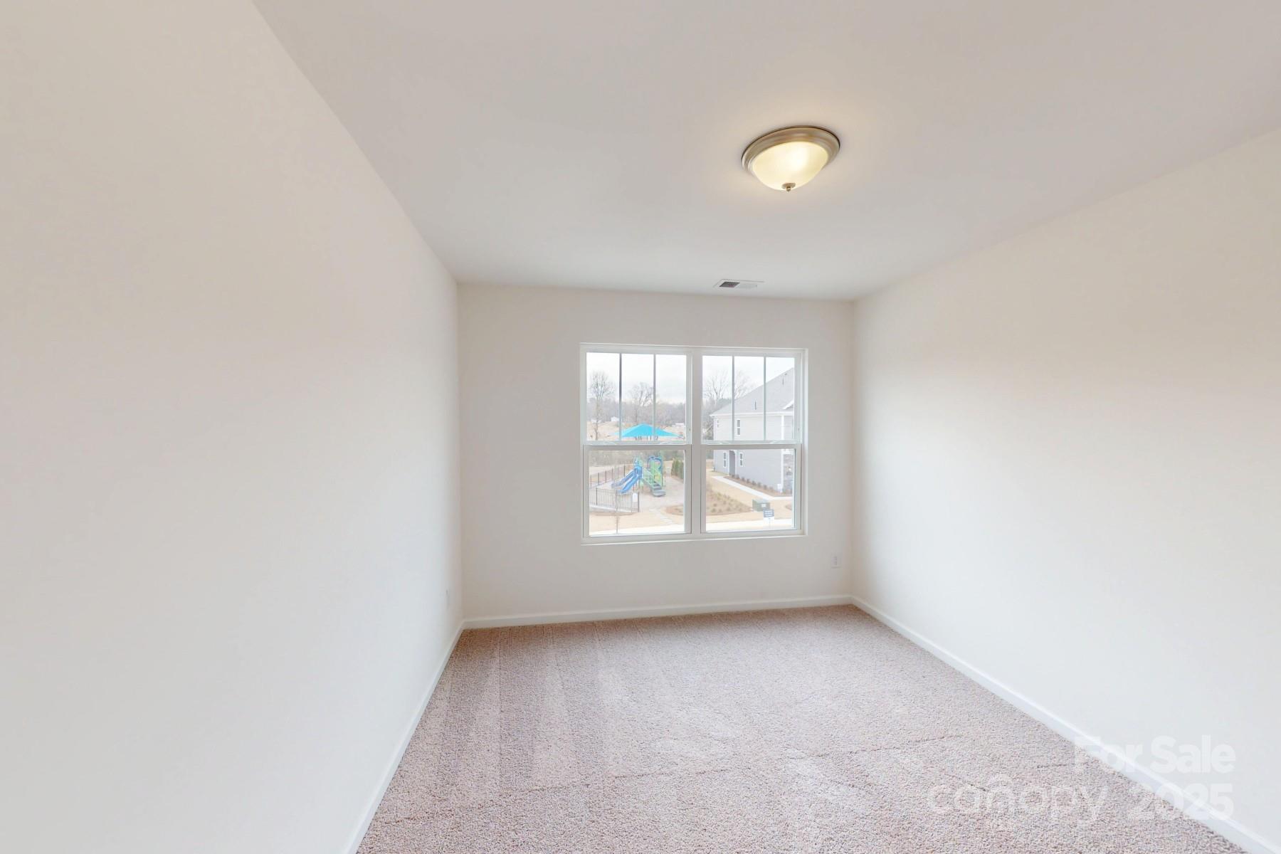 1030 Overbrook Place Wingate, NC 28174 - Photo 13 of 21 an empty room with window
