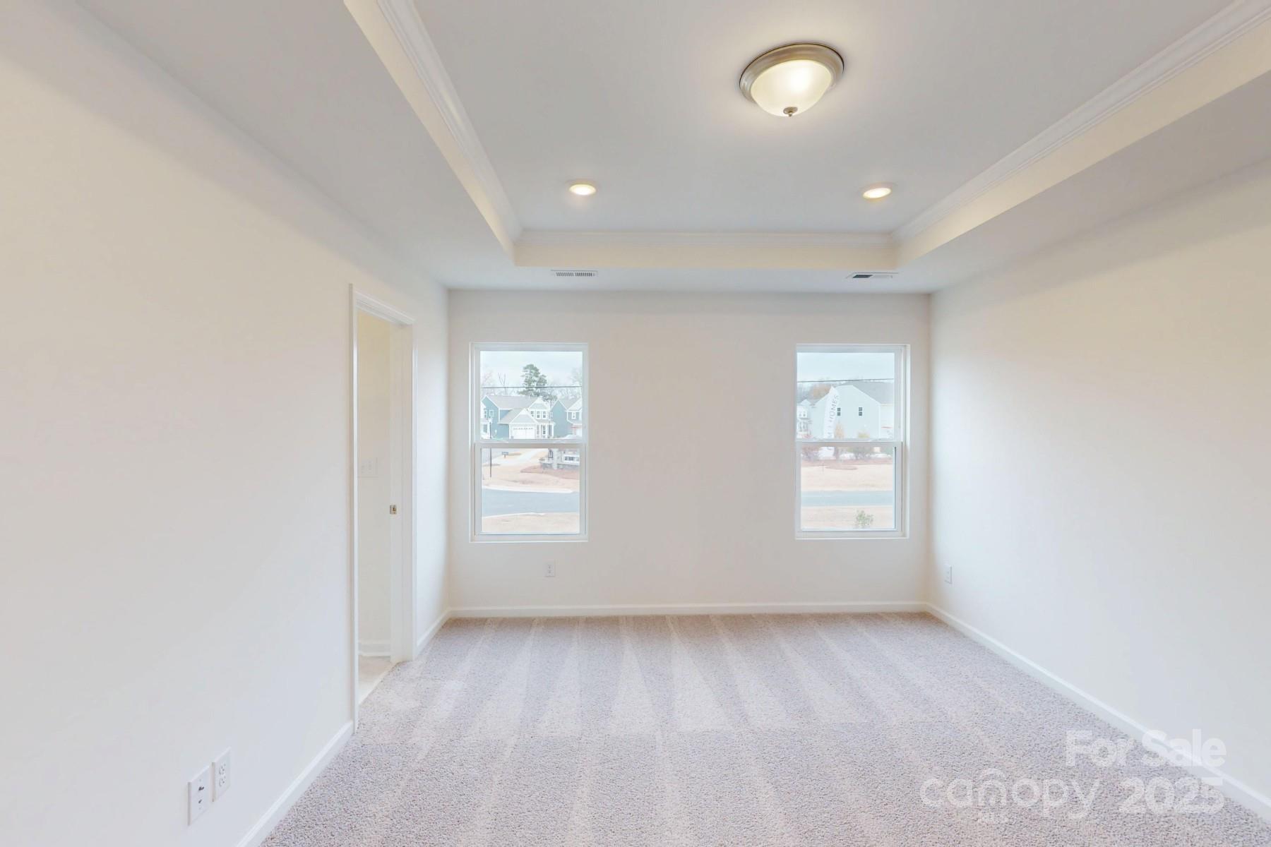 1030 Overbrook Place Wingate, NC 28174 - Photo 16 of 21 an empty room with windows