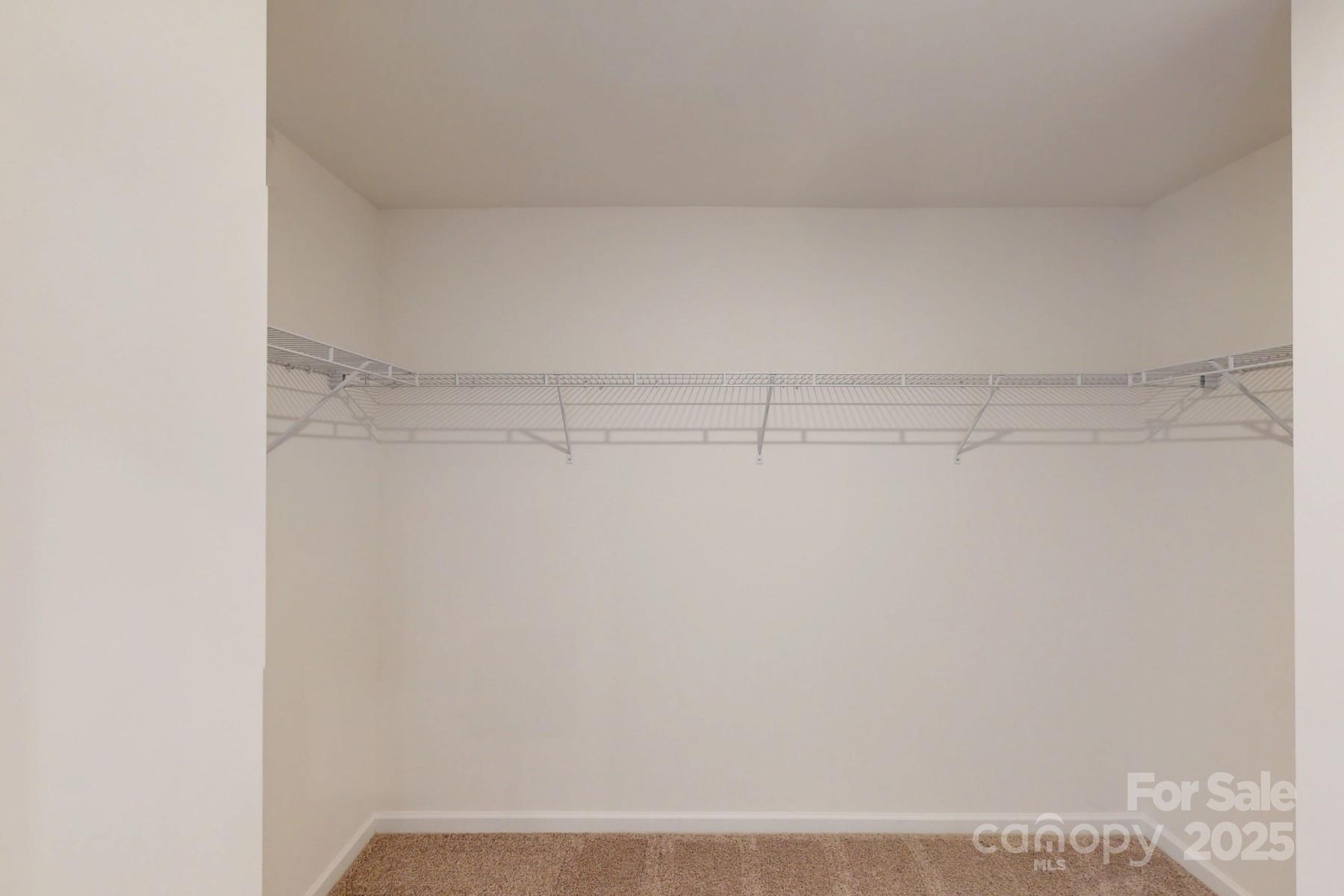 1030 Overbrook Place Wingate, NC 28174 - Photo 19 of 21 a view of small space with racks on the wall