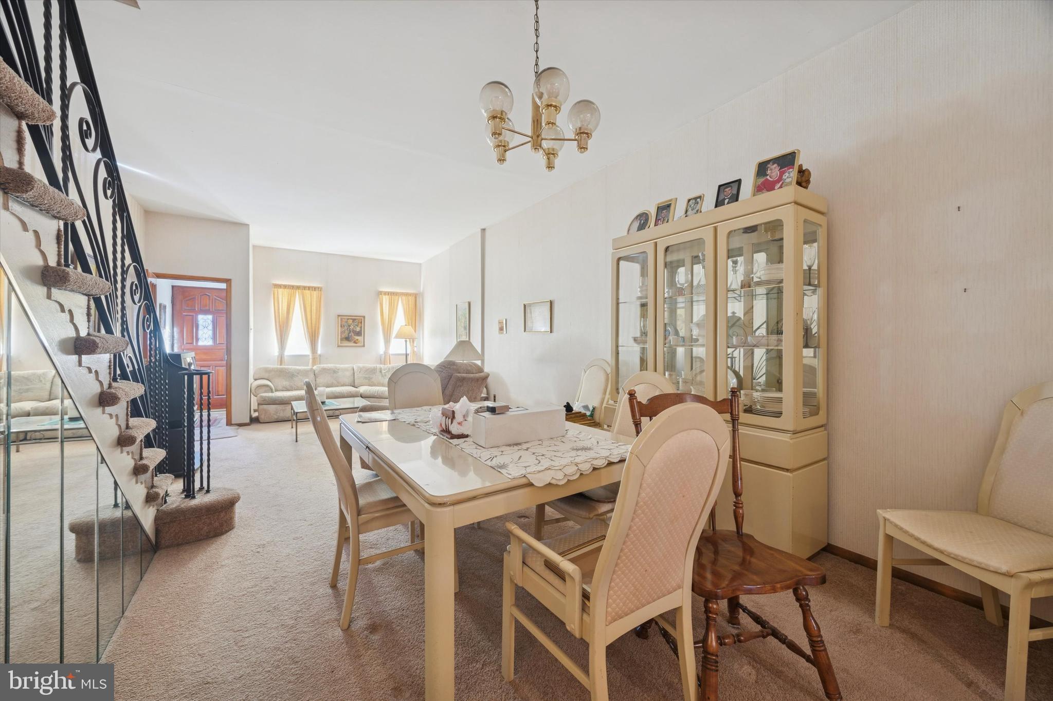 2020 South 9th Street Philadelphia, PA 19148 - Photo 5 of 19 a dining room with furniture a chandelier and wooden floor