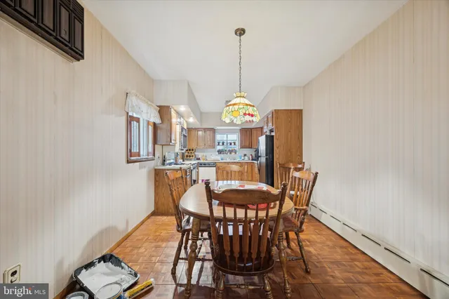 a view of a dining room with furniture